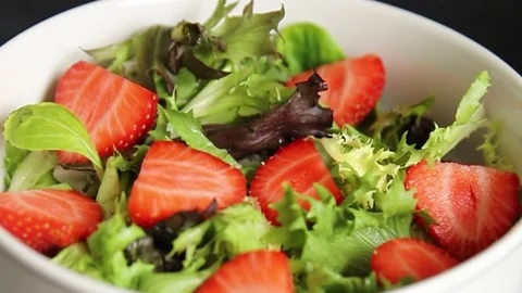 Strawberry salad lunch or dinner tasty organic snack fresh food background Stock Footage 335827429