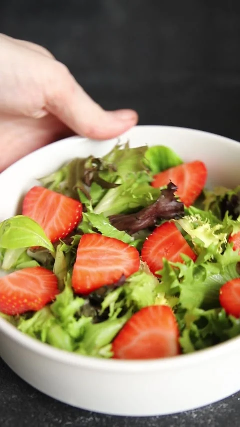 Strawberry salad lunch or dinner tasty organic snack fresh food background Stock Footage 335827430