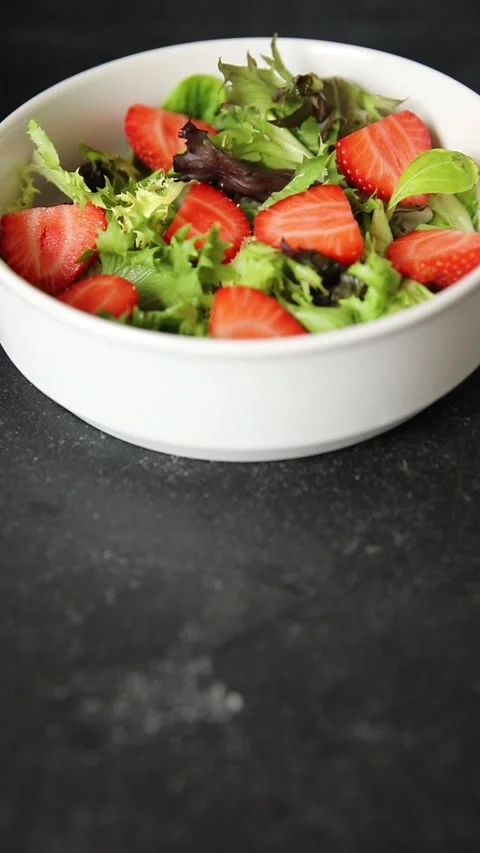 Strawberry salad lunch or dinner tasty organic snack fresh food background Stock Footage 335827433