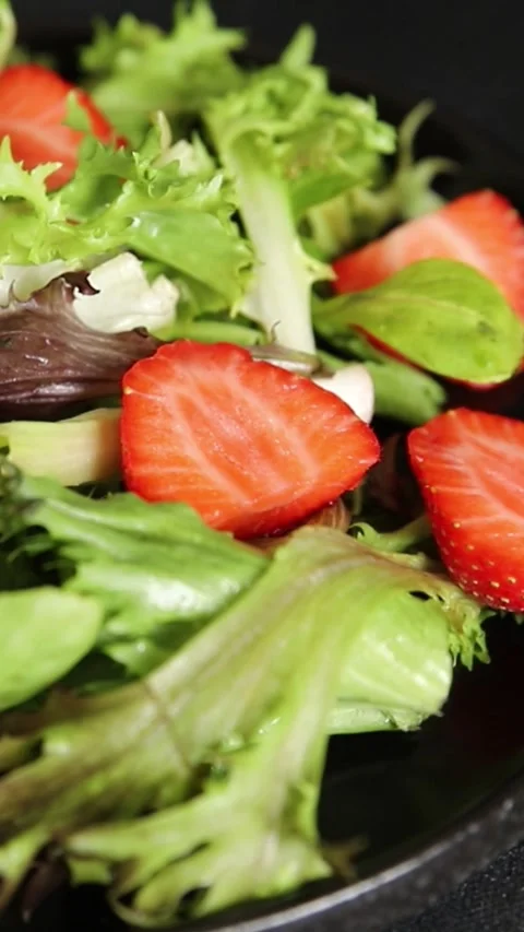 Strawberry salad lunch or dinner tasty organic snack fresh food background Stock Footage 335827444