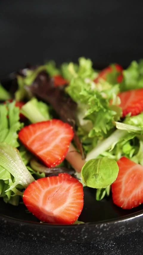 Strawberry salad lunch or dinner tasty organic snack fresh food background Stock Footage 335827446