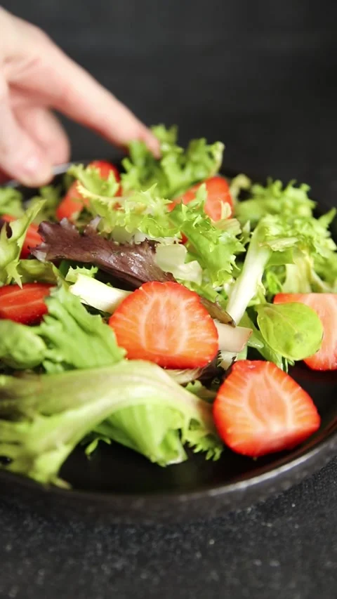 Strawberry salad lunch or dinner tasty organic snack fresh food background Stock Footage 335827449