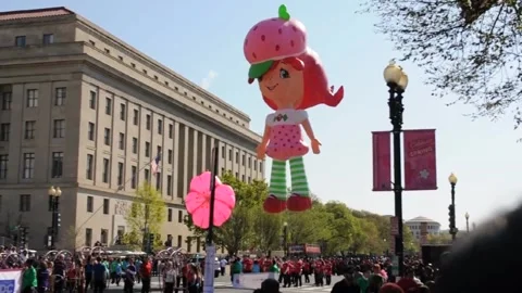 Strawberry Shortcake Balloon Float in in Washington on July 6, 2022 Stock Footage 348231786