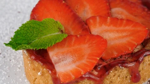 Strawberry shortcake, close-up view, a sweet dessert with sliced strawberries Stock Footage 95345586