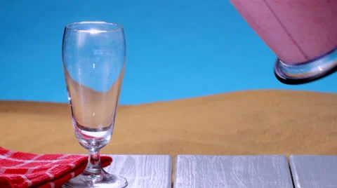 Strawberry smoothie at the beach Stock Footage 23724141