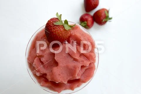 Strawberry smoothie with berry on white Stock Photos
