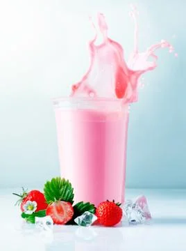 Strawberry smoothie splash Stock Photos