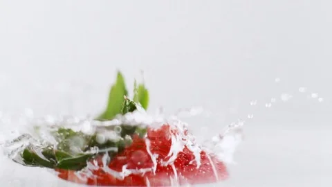 Strawberry Splash Stock Footage 70363386