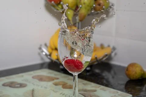 Strawberry Splash in wine Stock Photos