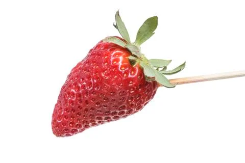 Strawberry on stick Stock Photos