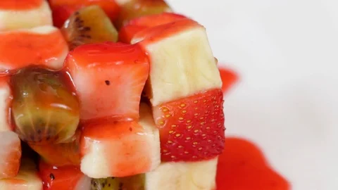 Strawberry Syrup On Fruit Cubes Stock Footage 87957599