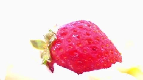 Strawberry tartlet rotating on white background Stock Footage 345340402
