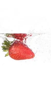 Strawberry In Water Stock Photos
