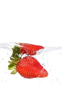 Strawberry In Water Stock Photos