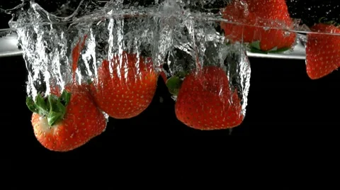 Strawberry in water, Slow Motion Video stock 9300908