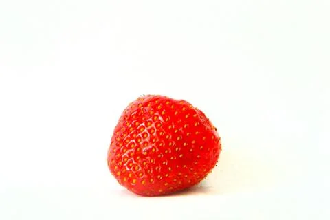 Strawberry without stem on white background with shadow. Red ripe berry with Stock-Fotos