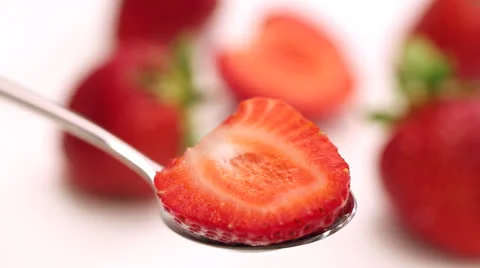 Strawberry in yogurt Stock Footage 24720239