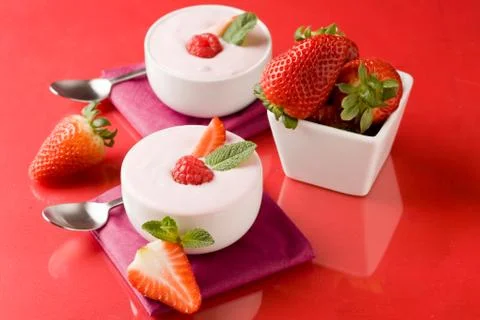 Strawberry yogurt with mint leaf Foto stock