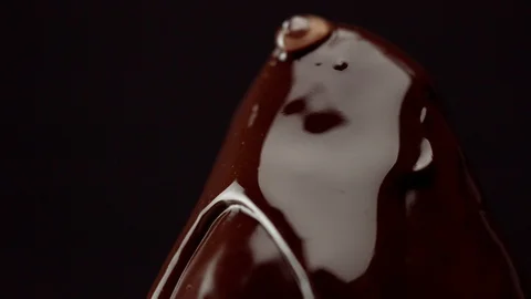 Strawbery on black, covered by chocolate Stock Footage 86288628