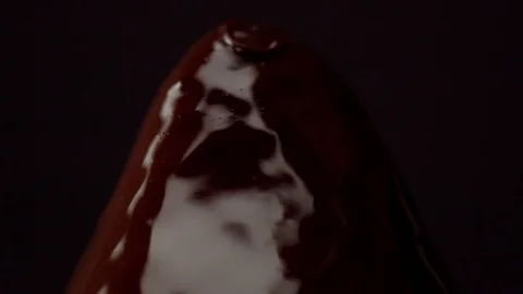 Strawbery on black, covered by chocolate Stock Footage 86288900