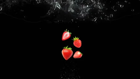 Strawbery fallin in water Stock Footage 141122168