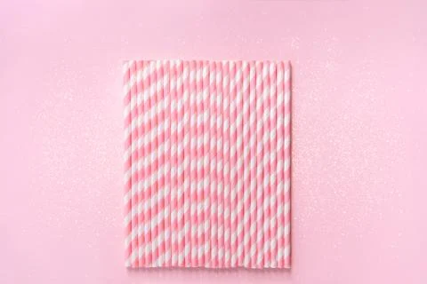 Straws on background with sparkles Stock Photos
