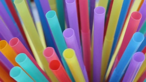 Straws plastic straw drinking disposable straw background stock footage video Stock Footage 98139439