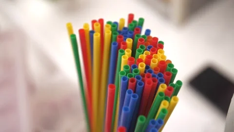 Straws plastic straw drinking disposable rotating background Stock Footage 241093649