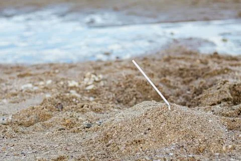 Straws on sand. Stock Photos