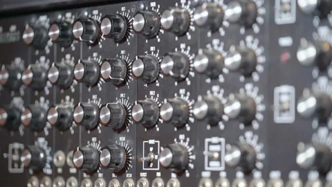 Streak Of Light On Knobs Of An Audio Mixing Console In A Recording Studio. 動画素材 217671296