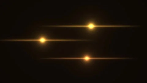 Streaks of light move across a dark background in a Stock Footage 338332459