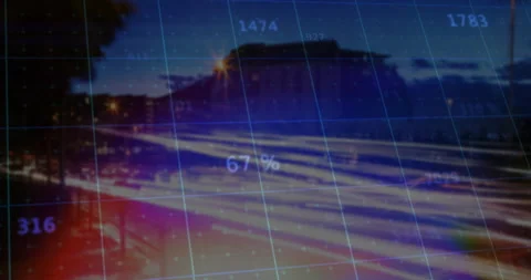 Streaks of red and white lights racing down urban road, grid overlay showing Stock Footage 309102932
