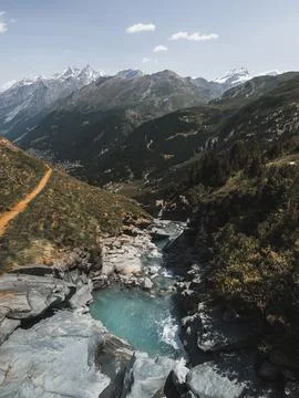 Stream in alps Stock Photos