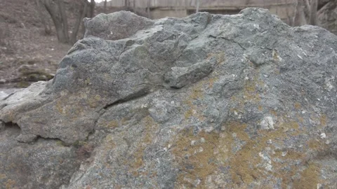 Stream and bridge behind the rock Stock Footage 237713548