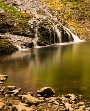 Stream and waterfall through the forest in Rodopi mountains, Greece Stock Photos
