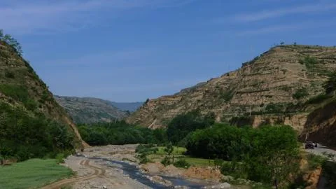 A Stream Between Mountains Stock Photos