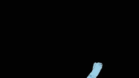 A stream of blue water breaks after it flies up. Super slow motion. Stock Footage 123023107