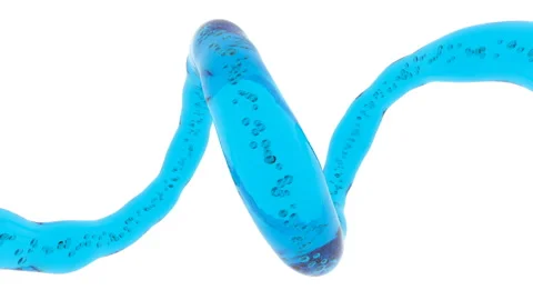 A stream of blue water flows in a winding path over a white background Stock Footage 128444322