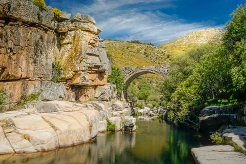 Stream channeled between rocks Stock Photos