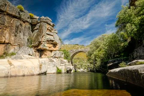 Stream channeled between rocks Stock Photos