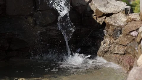 A stream of clean water. A small waterfall, a source of clear cold water Stock Footage 274249890