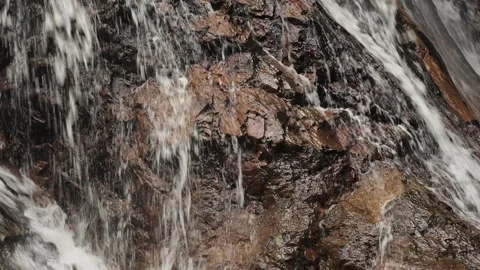Stream of clear fresh water on rocks Stock Footage 330872360