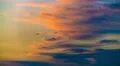 The stream of cloud against the sunset. Time lapse 4k or 4k+ Resolution