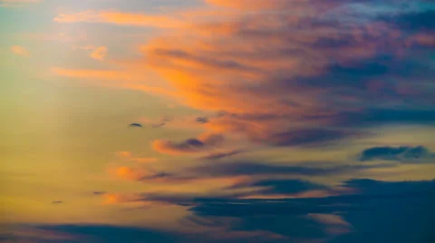 The stream of cloud against the sunset. Time lapse Stock Footage 62942066