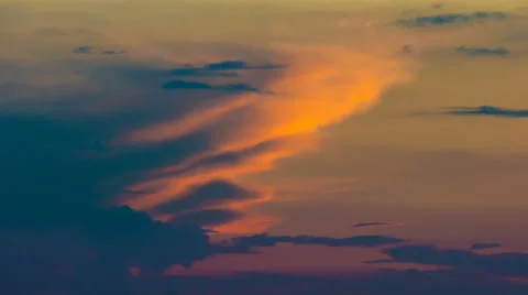 The stream of cloud against the sunset. Time lapse Stock-Footage 62942265
