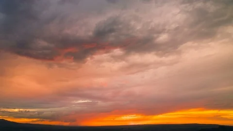 The stream of a cloud on the background of a sunset. evening night time Stock Footage 78793540