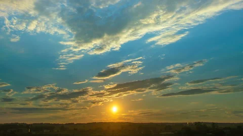 The stream of cloud on the background of sunset. Time lapse Vídeo Stock 63778226