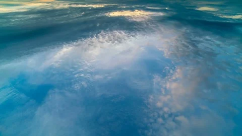  The stream of clouds in the sky. wide angle. plane view Stock Footage 77722142