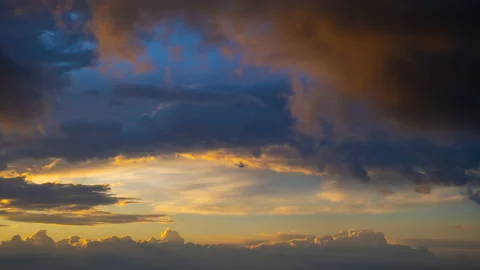 The stream of clouds on the sunrise background. time lapse Stock Footage 110416000