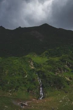 Stream creek falling down the mountain Stock Photos